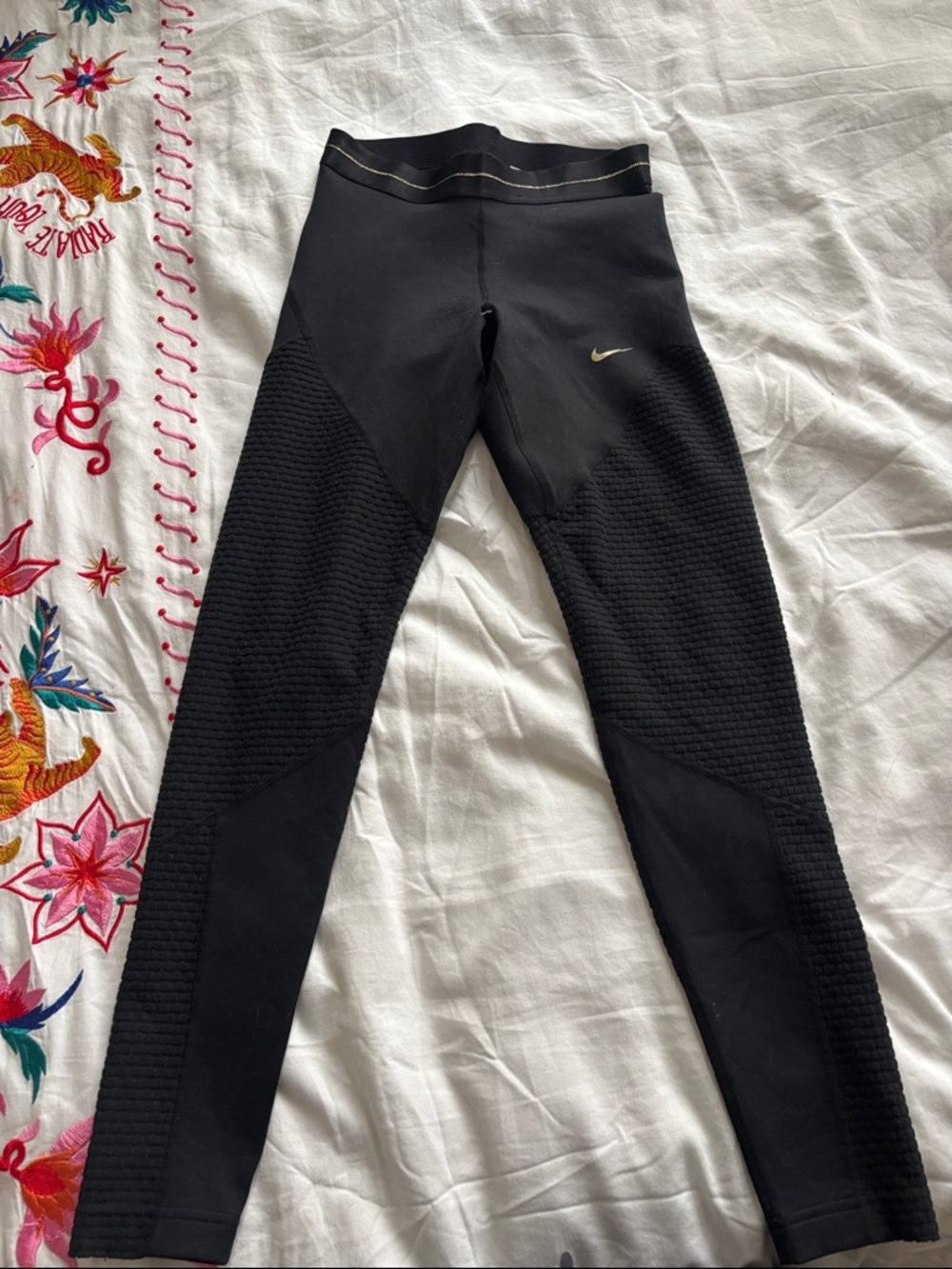 Nike Black Leggings with Gold Swoosh Accent